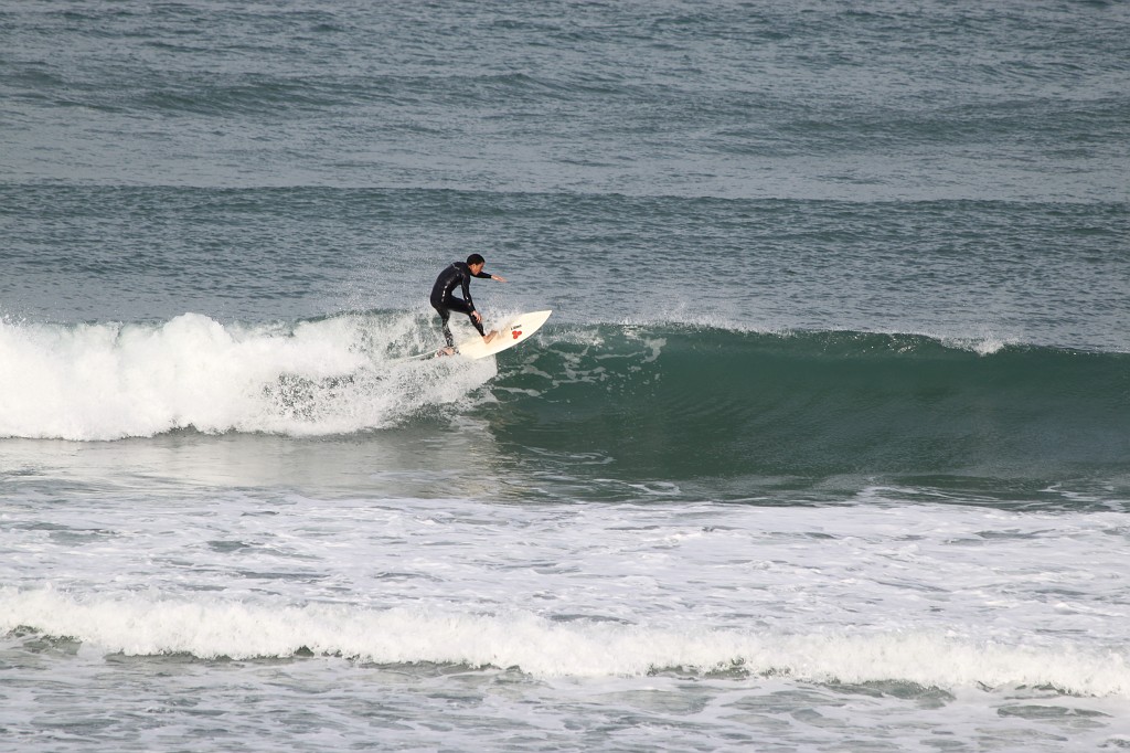 IMG_0110.JPG - Surfer on the beach