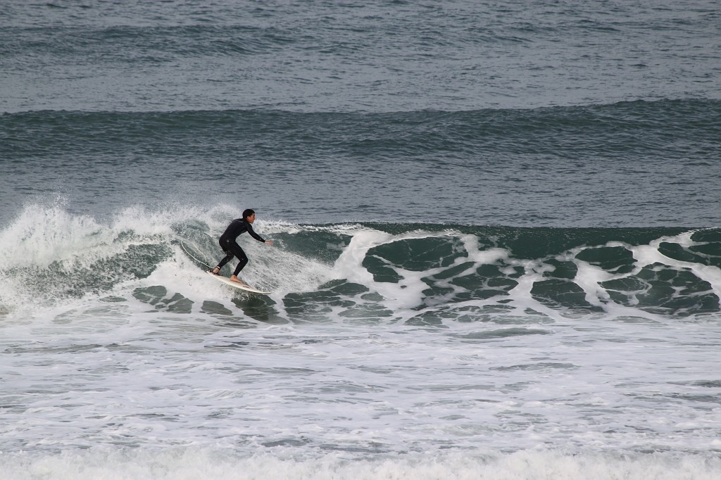 IMG_0117.JPG - Surfer on the beach