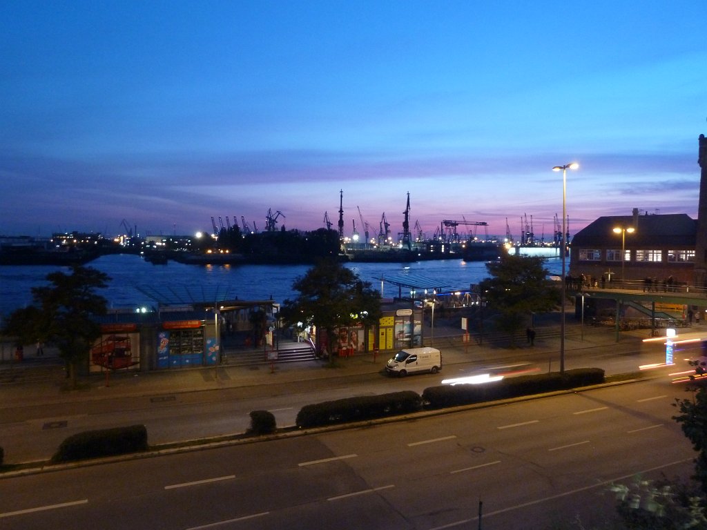 P1050244.JPG -  Hamburg harbour  view from at sunset. The  Landungsbrücken  silhouette in the foreground.
